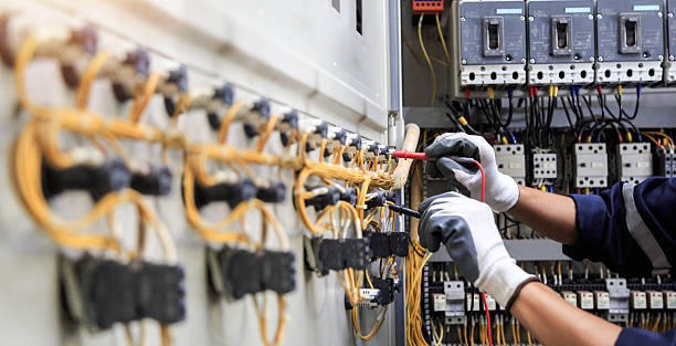 Professional Electrical Panel Upgrade technician working in Escambia County County, FL